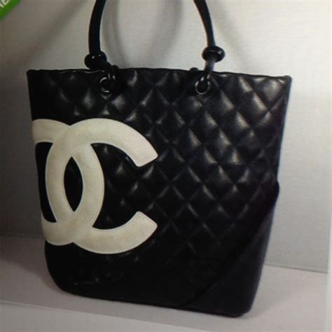 black chanel purse with white logo|chanel purses black original.